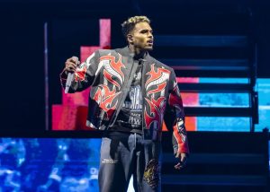 R&B singer Chris Brown, 36, remanded in CUSTODY after being charged with grievous bodily harm in alleged bottle attack