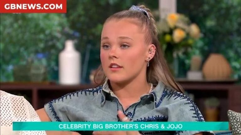 Chris Hughes says girlfriend JoJo Siwa ‘still part of LGBTQ community’ after facing backlash to relationship